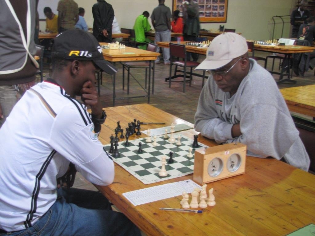 Larry Kagambi (right) in action.