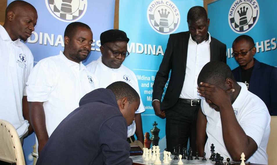 Tense moments IM Chitumbo Mwali 'Copper Eagle' right takes on one of his opponents.