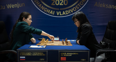 Aleksandra Goryachkina makes her move in game number 8.