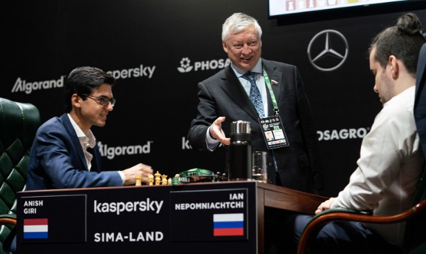 Anatoly Karpov made the first move in the game between Anish Giri and Ian Nepomniachtchi.