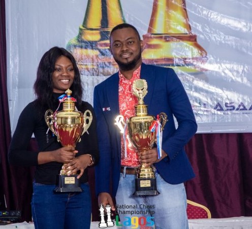WFM Ogbiyoyo Perpetual Eloho and IM Balogun Oluwafemi the winners of the 2021 Nigeria Chess Championship.