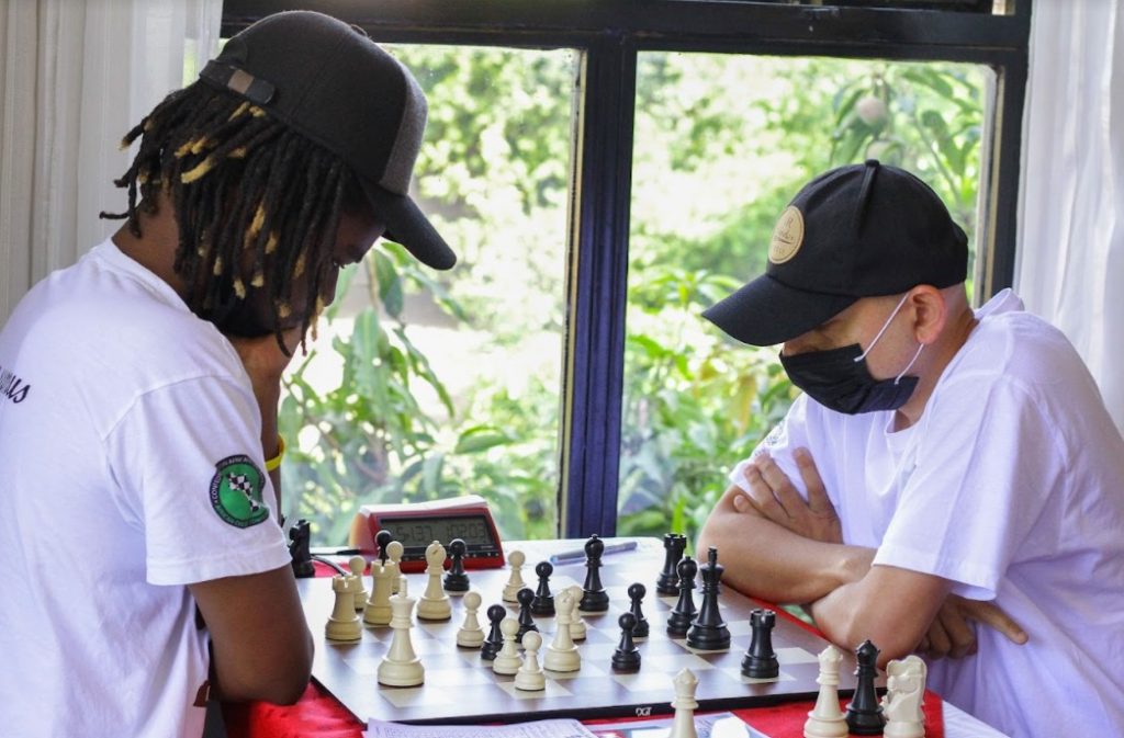 Martin Njoroge (left) and Mehul Gohil in their round seven encounter of the 2021 Kenya Chess Championship which ended in a draw 