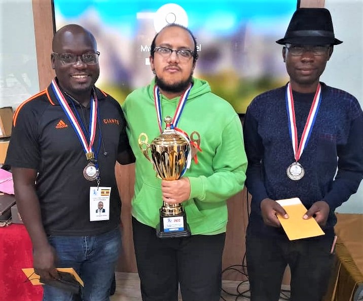 Prize winners of the 2022 Uganda Masters IM Norm Chess Tournament from left - IM Arthur Ssegwanyi was third, winner GM Adham Fawzy of Egypt . and IM Gillan Bwalya of Zambia who was second 
