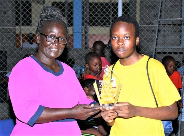 CM Aguda Lwanga receives his prize for winning the Open U16 section.