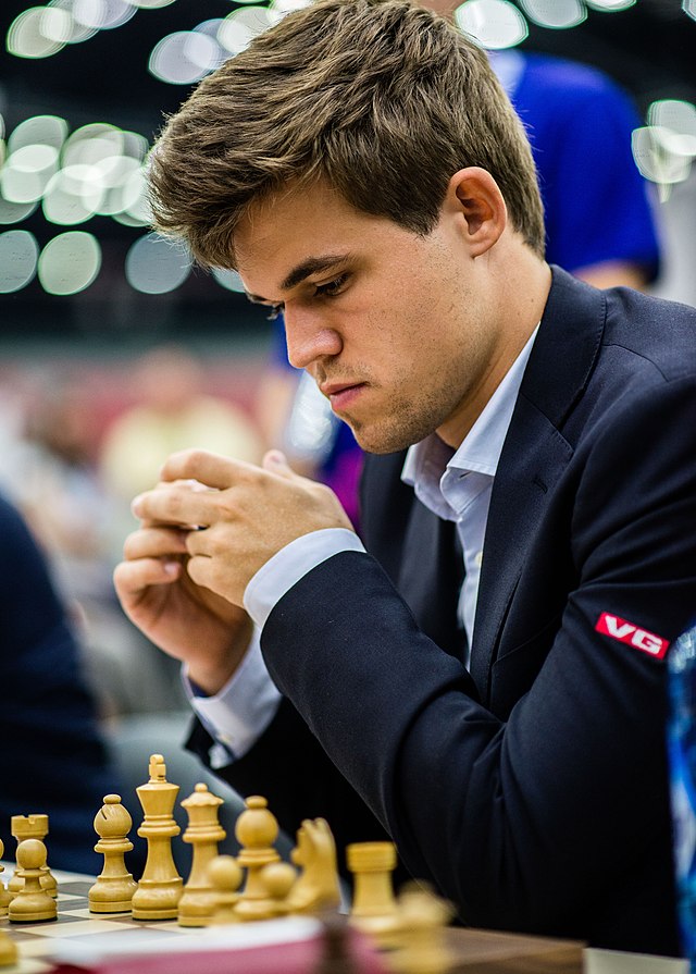 Magnus Carlsen at the 2016 Chess Olympiad. Photo credit Andreas Kontokanis http://andreas.photo, World Chess Champion