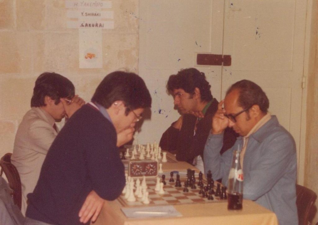 Saif Kanani (right with blue jacket) with Aslam Adam on his right in their match against Japan.