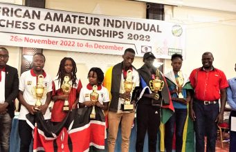 Prize winners and officials pose for a group photo at the end of the African Amateur 2022 Chess Championship.