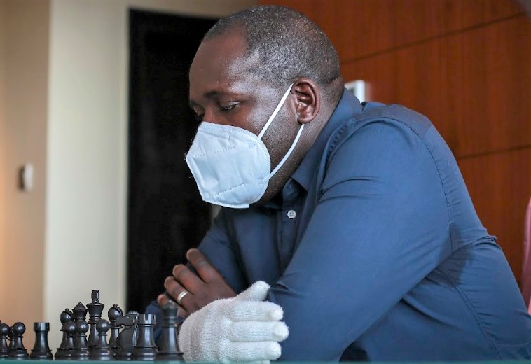 Dr Victor Ng'ani in action with his gloves and mask.