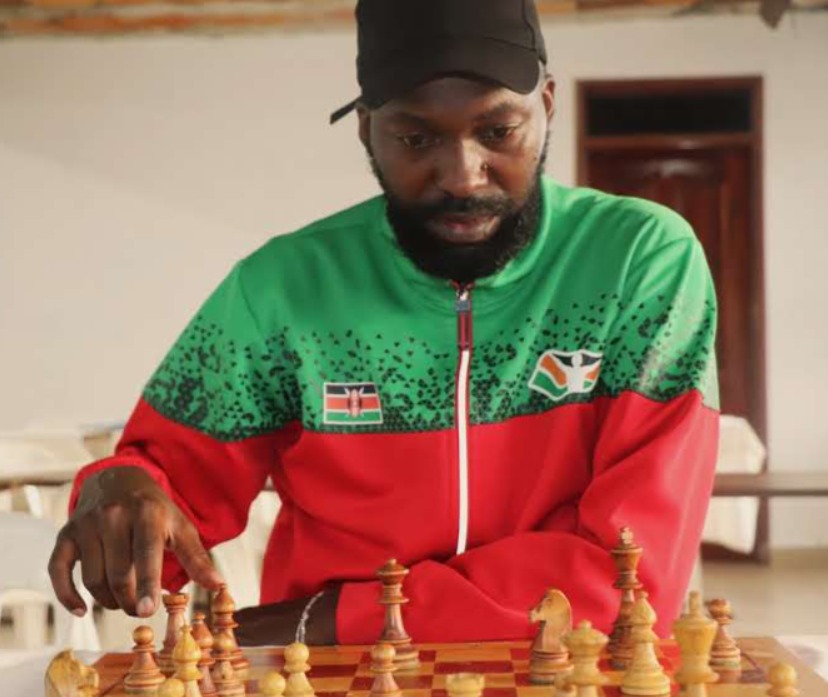 Moses Andiwoh of Kenya in action.  He ended up with 5 points out of 8 rounds and 22nd in the ranking.